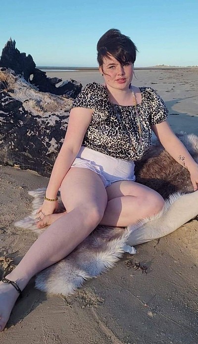 Leopard print velveteen on/off shoulder top. High rise frilled shorts.